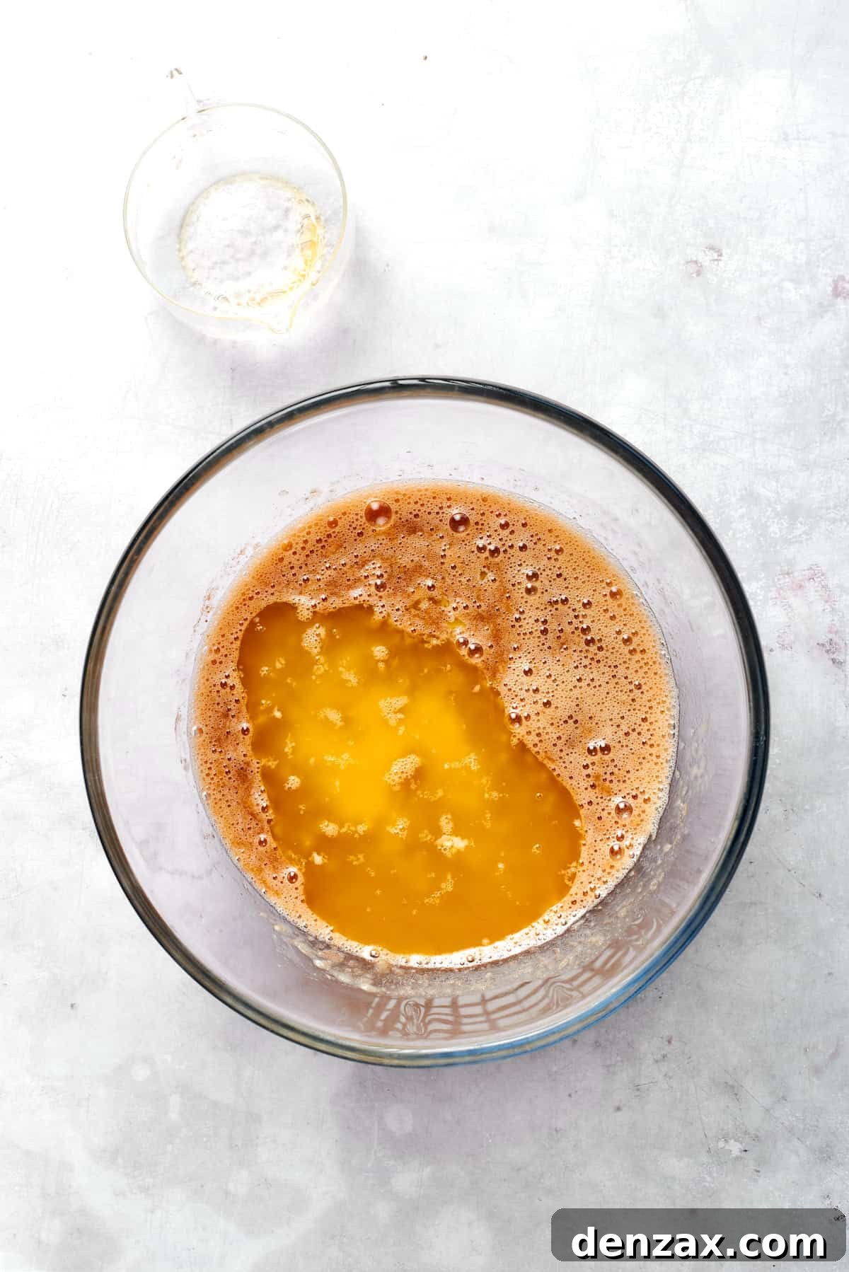 Butter is added to the banana muffins recipe batter.