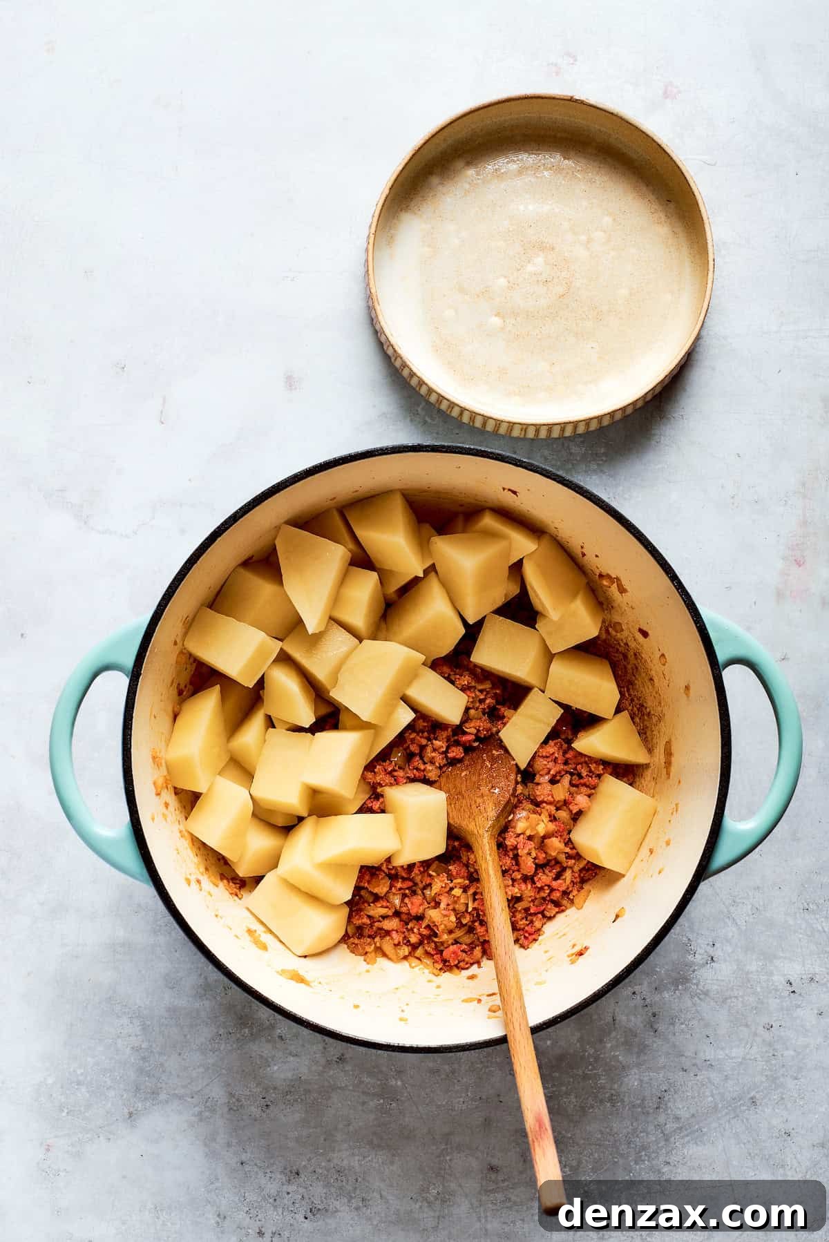 Potatoes are added to the sausage.