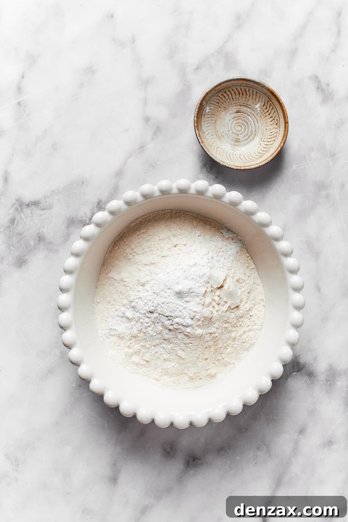 The dry mix for anginetti cookies in a bowl.