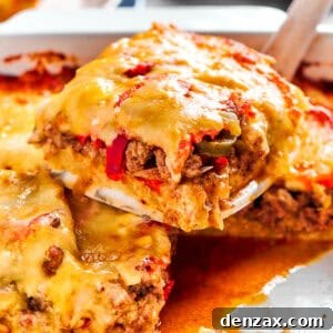 Savory John Wayne Casserole Recipe for Hearty Family Dinners 2 A slice of John Wayne Casserole getting scooped out of a casserole dish.