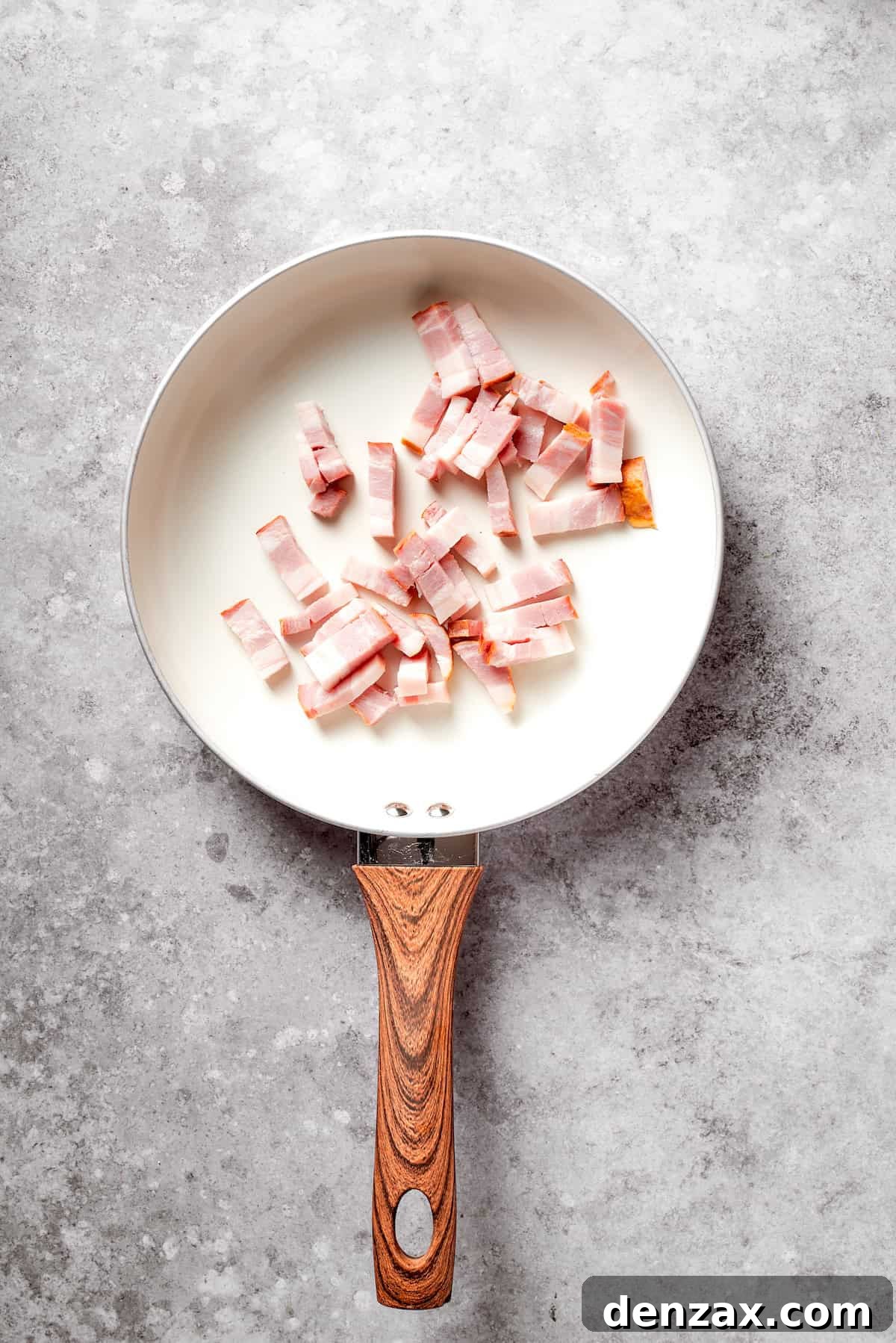 Chopped bacon in a pan.