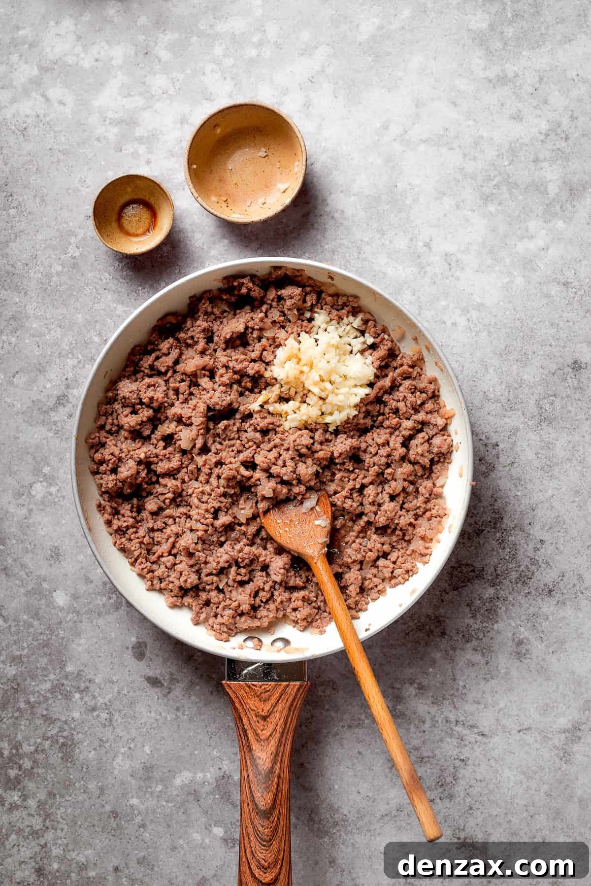Beef is browned in a skillet.