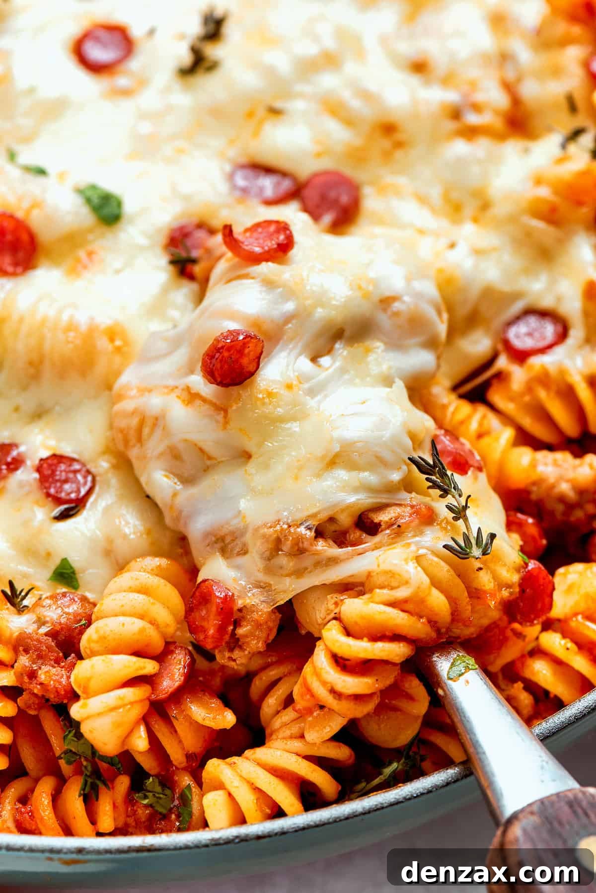 Melted cheese on pizza pasta.