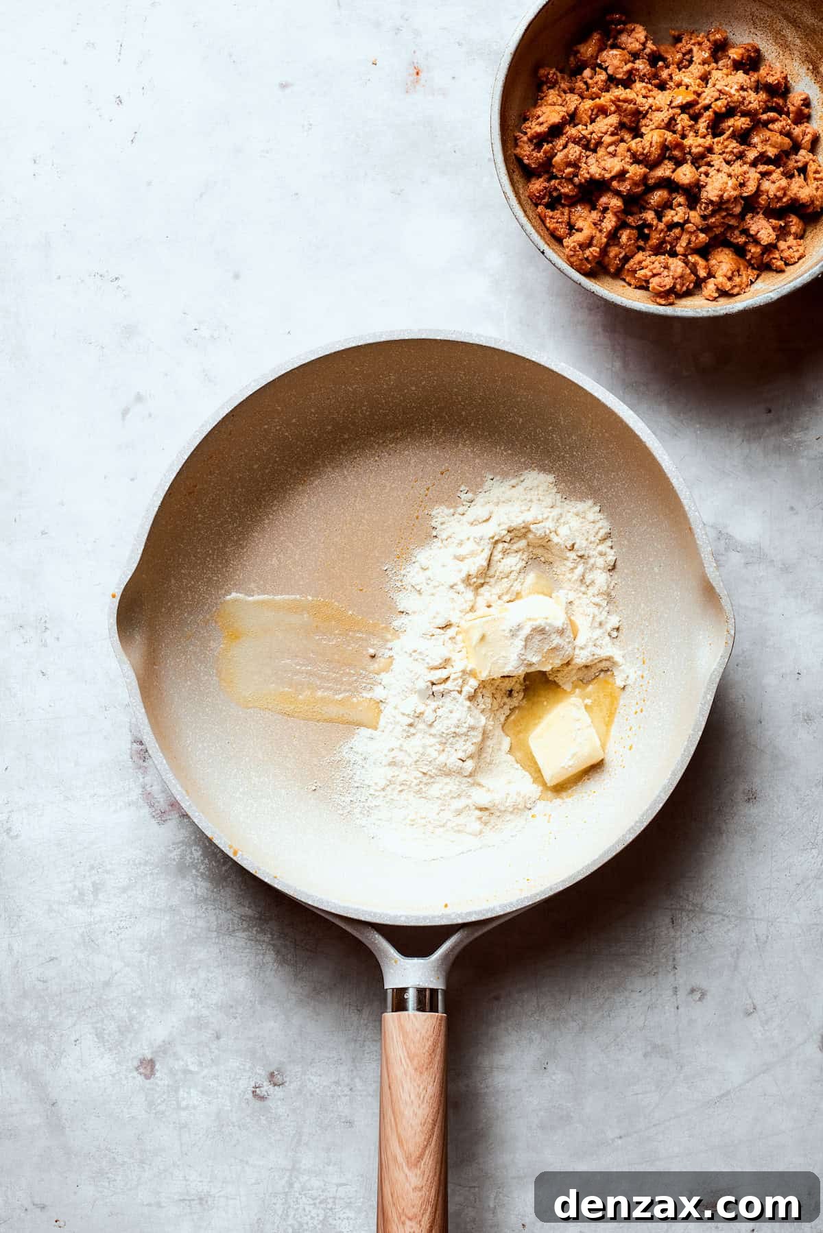 Butter and flour added to a skillet.