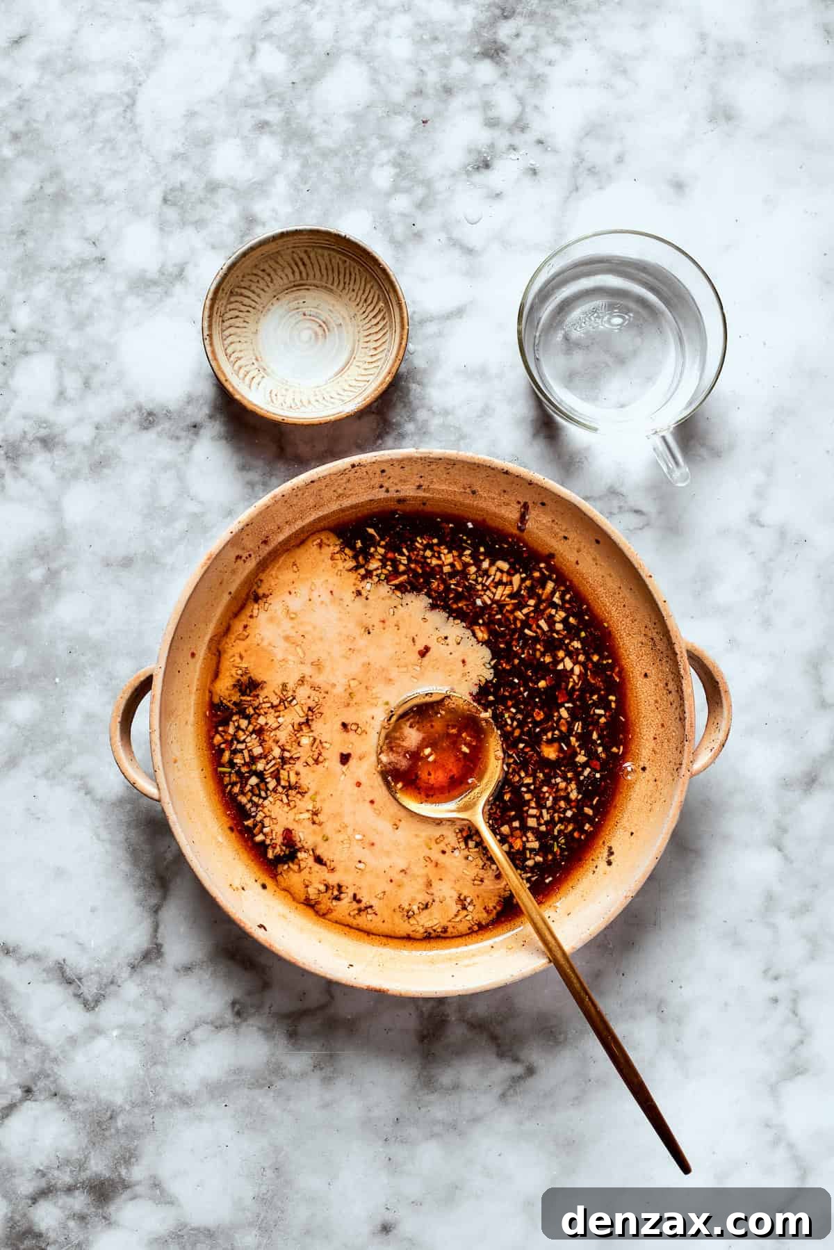 Teriyaki sauce is mixed in a bowl.