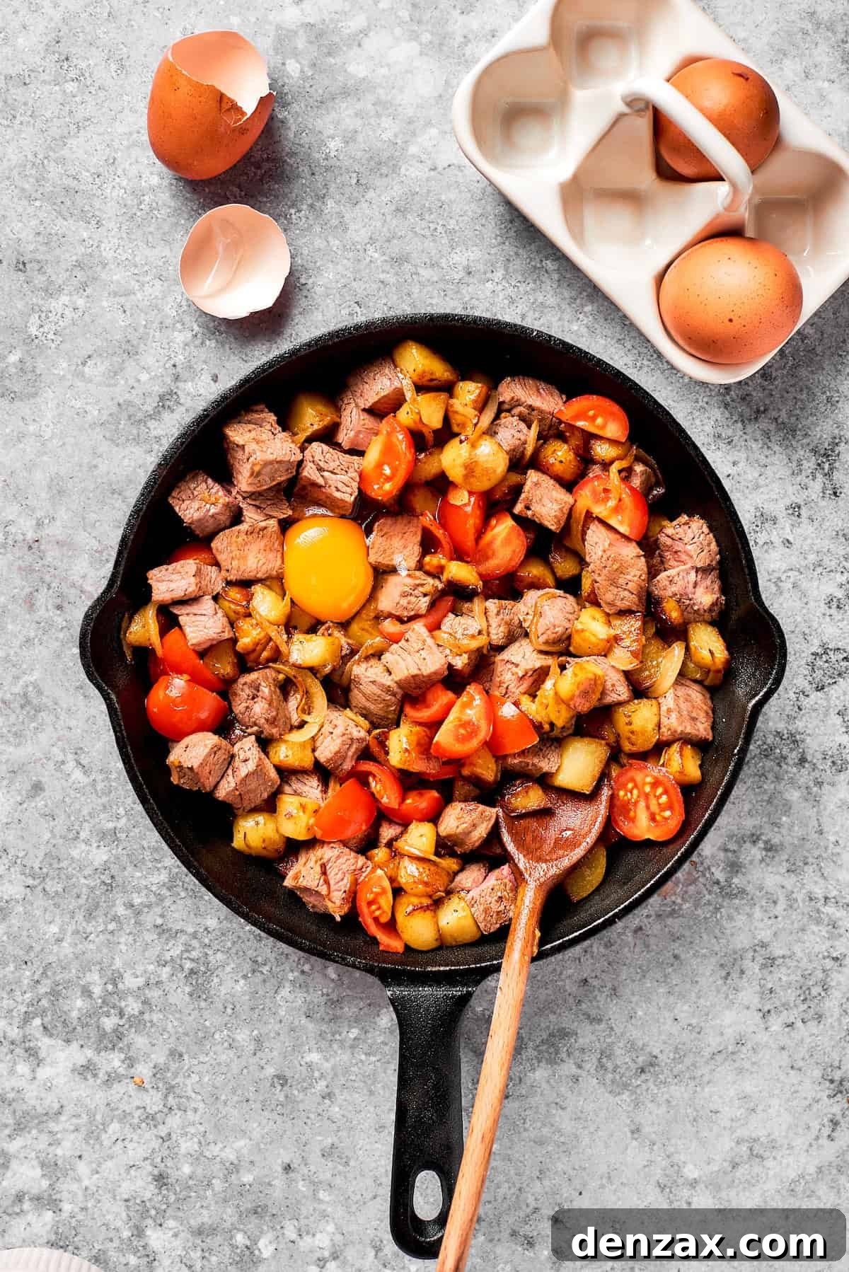 Eggs are added to steak and eggs.