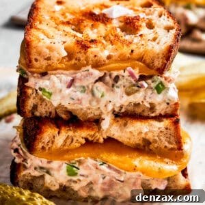 Two halves of tuna melt stacked on top of each other.