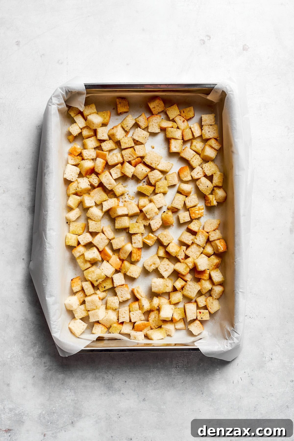 Make the croutons Homemade croutons cool on a lined baking sheet.