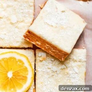 A square of lemon slice on top of other lemon slices.