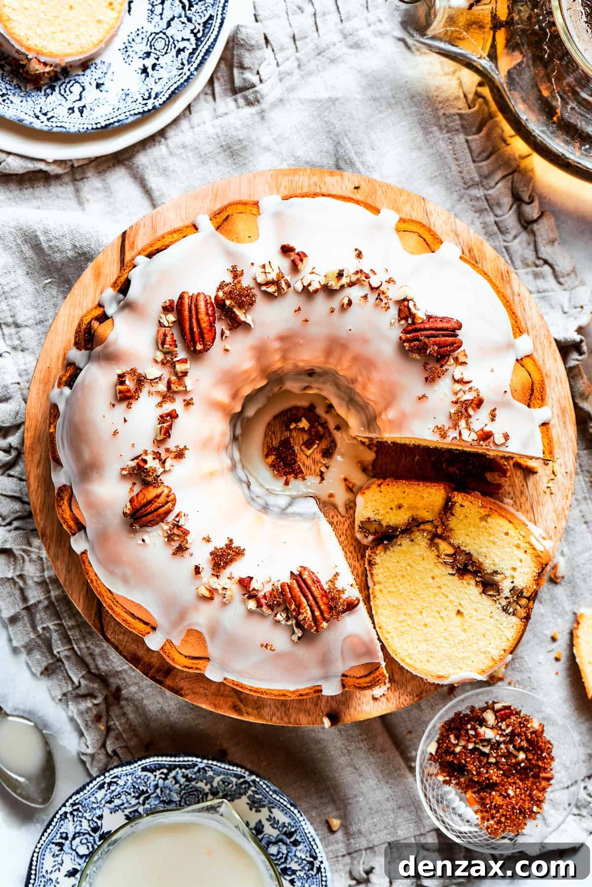 Overhead shot of a glazed sock it to me cake topped with pecans. Overhead shot of a glazed sock it to me cake topped with pecans.