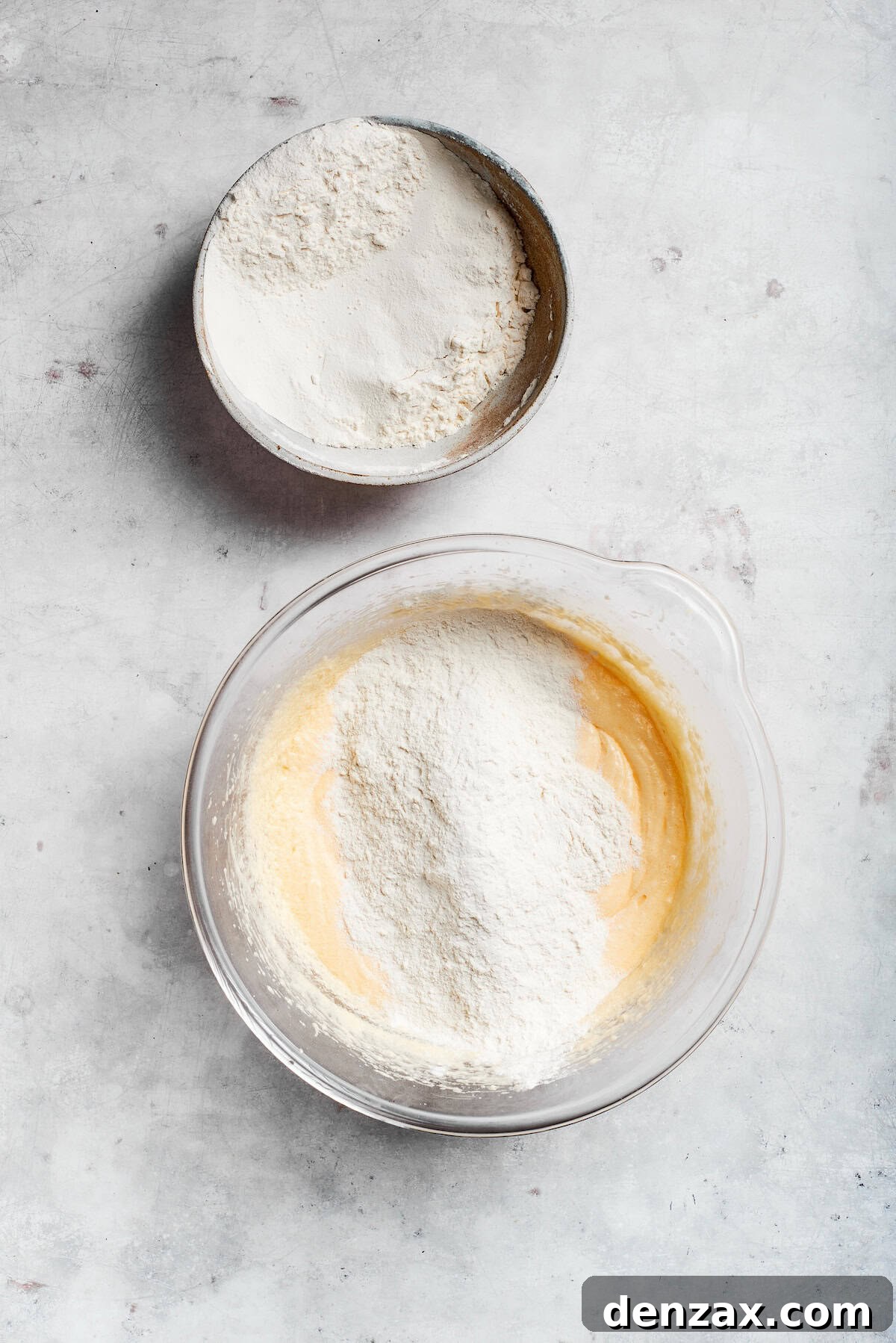 Add flour to batter. Flour mix is added to sock it to me cake batter.