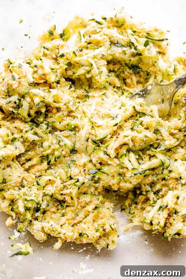 shredded zucchini in a glass bowl