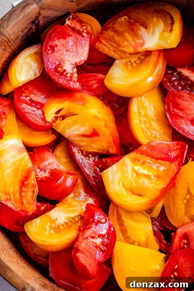 wedges of heirloom tomatoes in a salad bowl