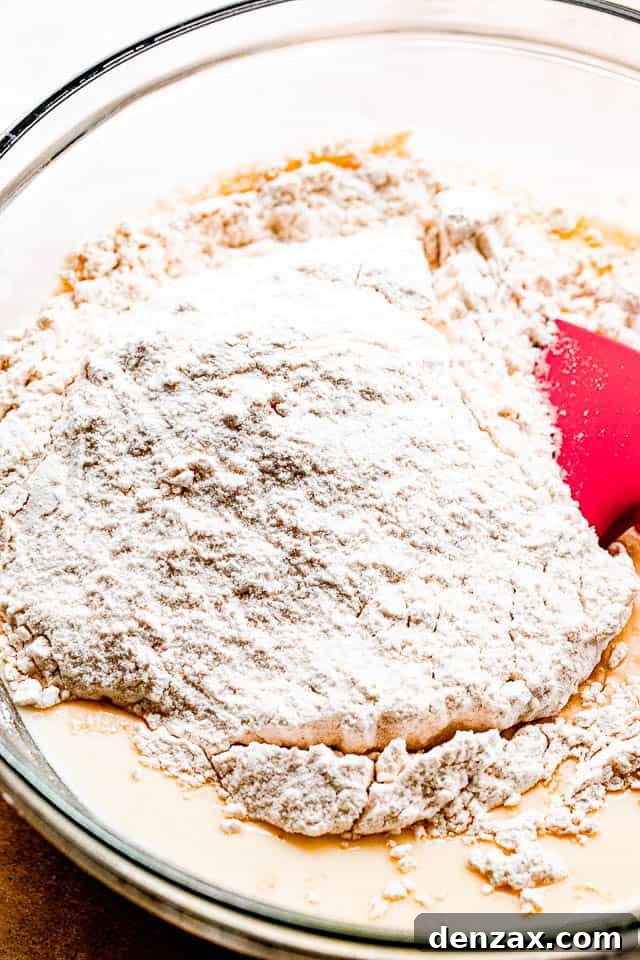 Sheet-Pan Pancakes Recipe: Fluffy Oven-Baked Pancake Tray 3 pancake batter in a glass mixing bowl