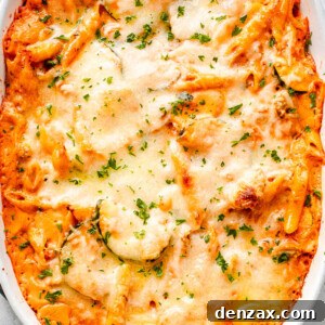 Creamy Baked Pasta with Zucchini and Mushrooms Recipe 7 overhead shot of a cheesy baked pasta and zucchini casserole