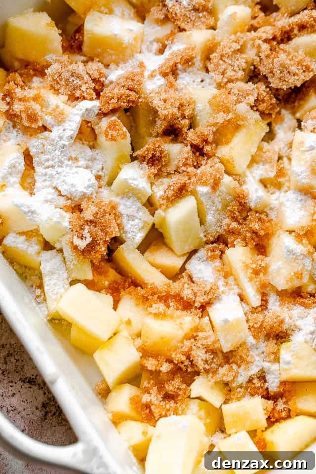 top view of diced apples tossed with brown sugar and flour