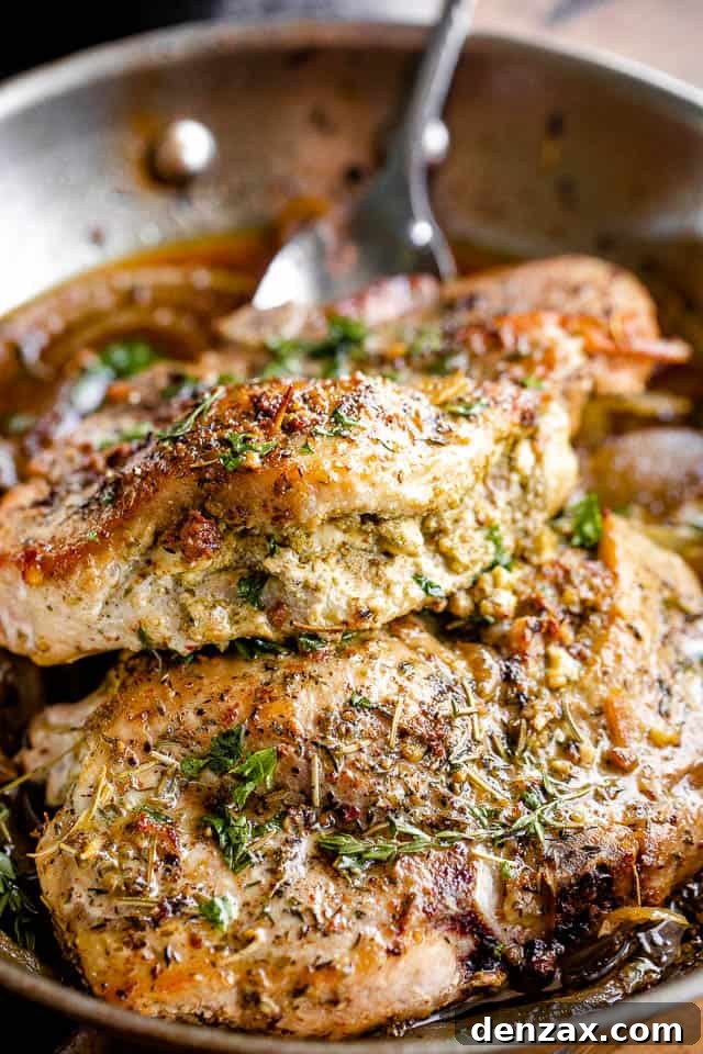 side shot of pesto filling stuffed in pork chops