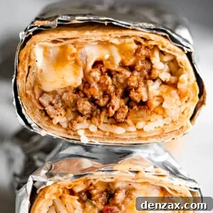 close up shot of two halved burritos stacked one on top of the other
