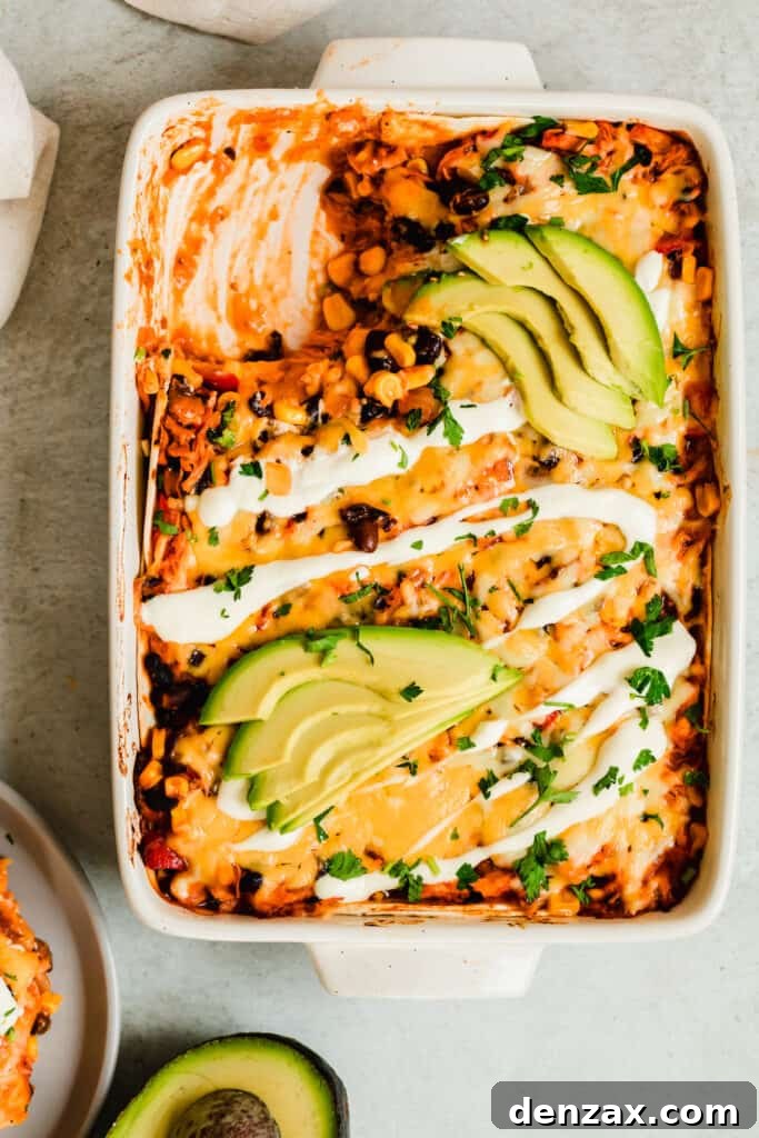 A Casserole in a Pan Next to a Halved Avocado and a Serving Plate