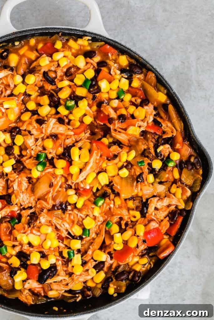A Chicken Casserole with Corn and Other Veggies in a Skillet