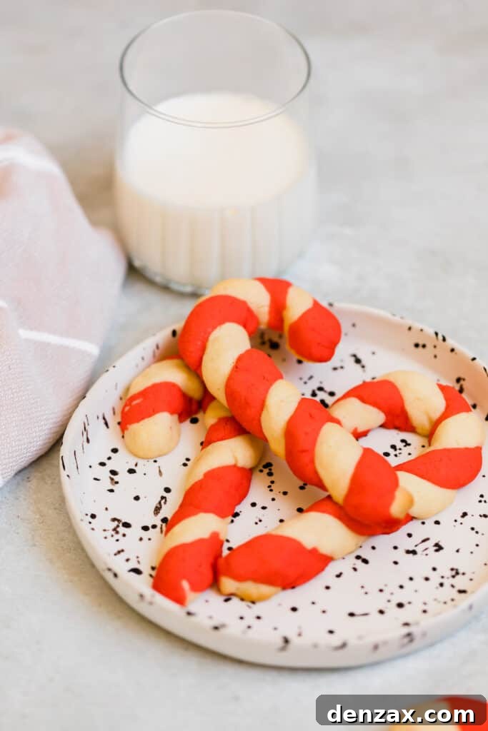A Pile of Candy Cane Cookies on a Black and White Plate
