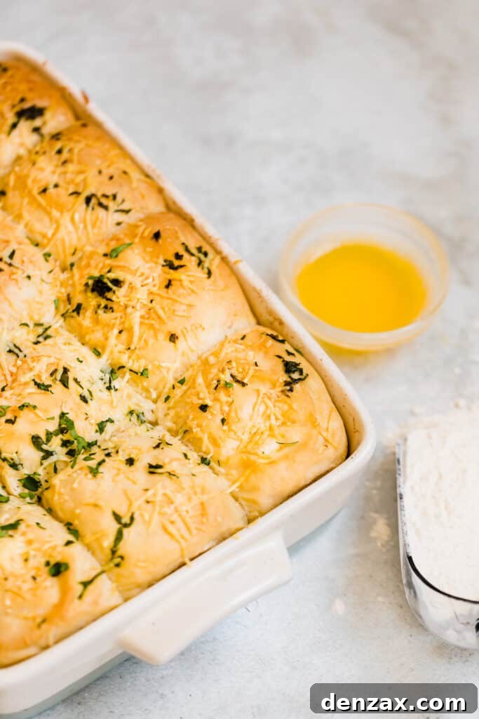 Golden-Brown Soft Parmesan Dinner Rolls in a Large Pan