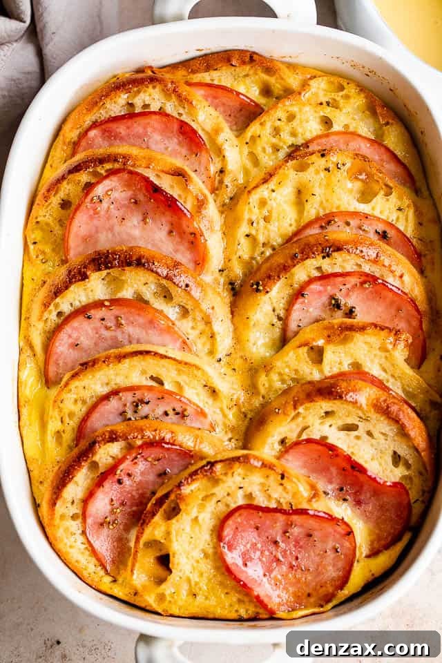 Make-Ahead Eggs Benedict Casserole for Brunch Crowd 3 overhead shot of eggs benedict casserole in a white baking dish