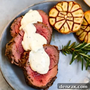 Three Slices of Juicy Beef Tenderloin Topped with Homemade Horseradish Sauce