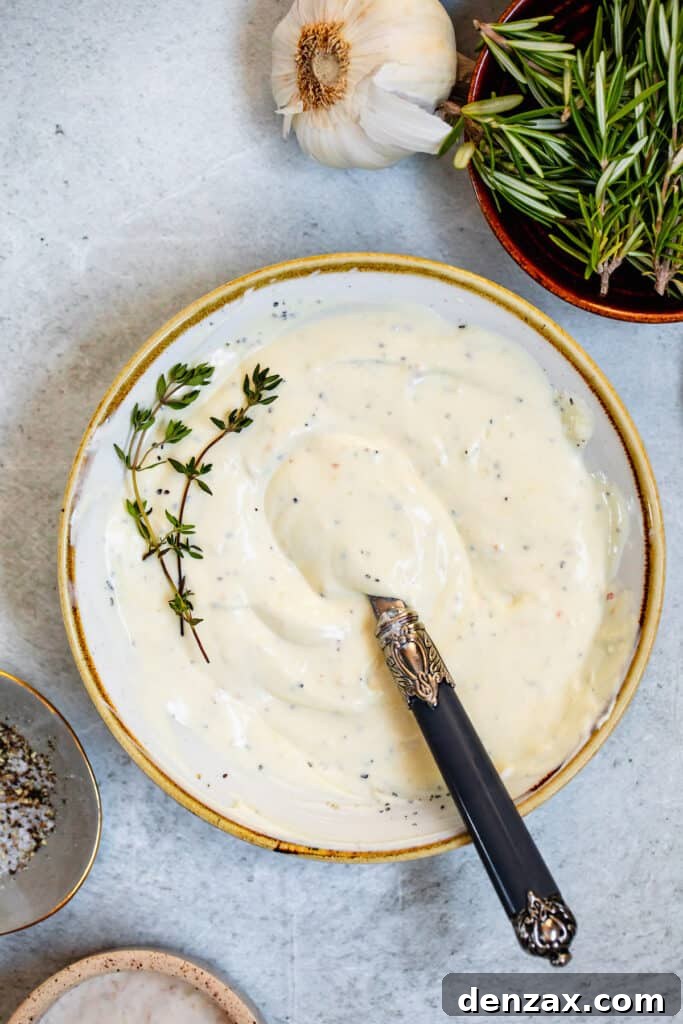 A Bowl of Homemade Horseradish Sauce with a Fancy Spoon Inside
