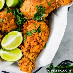 A Basket of Buttermilk Fried Chicken with Lime Wedges Inside