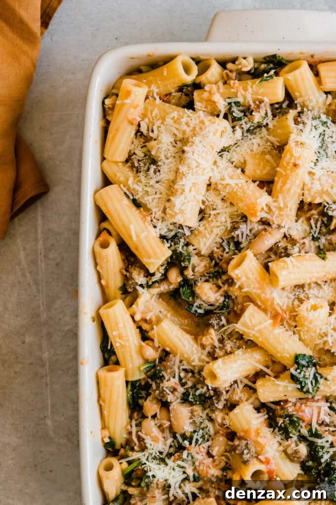 Unbaked rigatoni topped with cheese