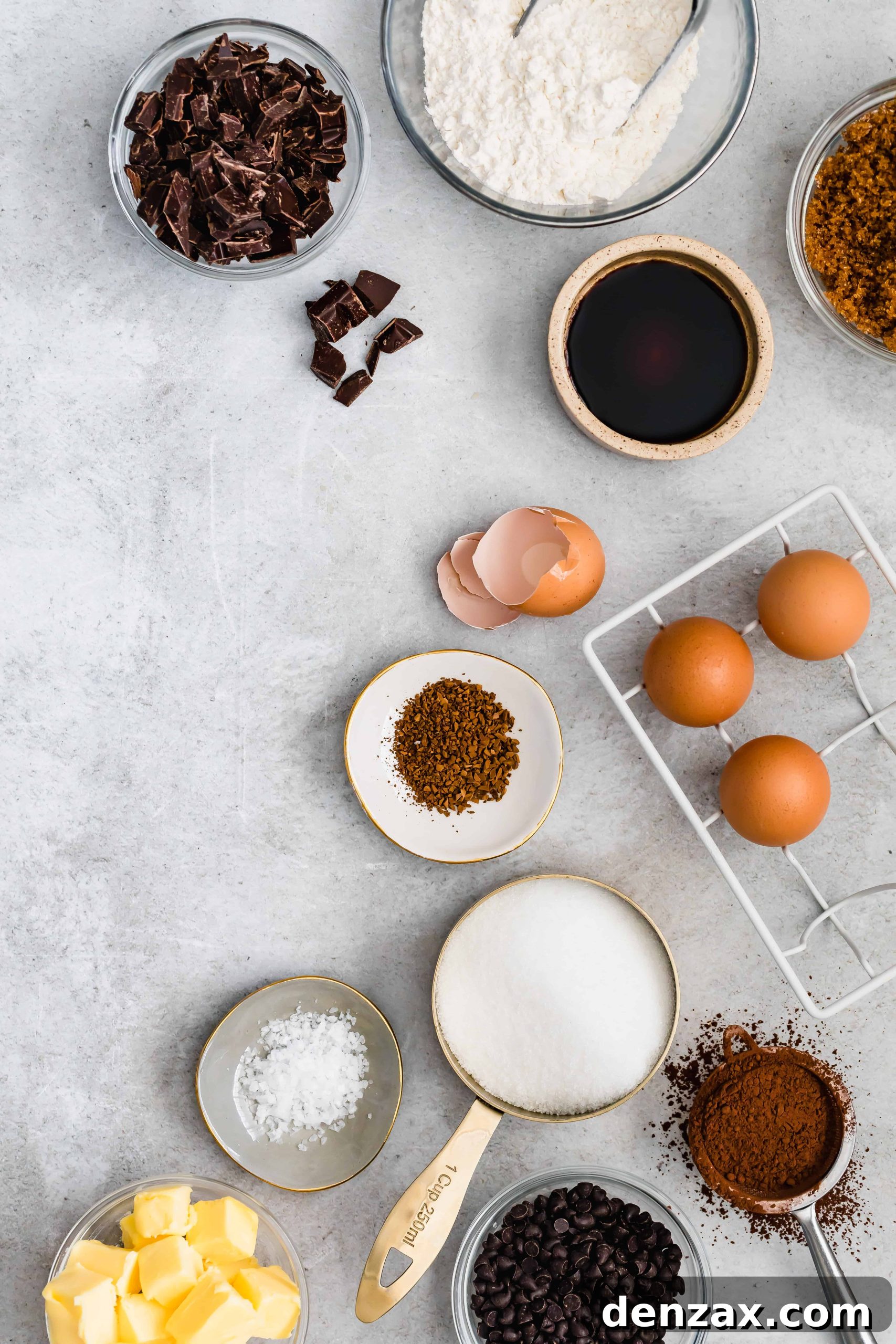 Sugar, Eggs, Chopped Dark Chocolate, and the Rest of the Brownie Ingredients on a Countertop