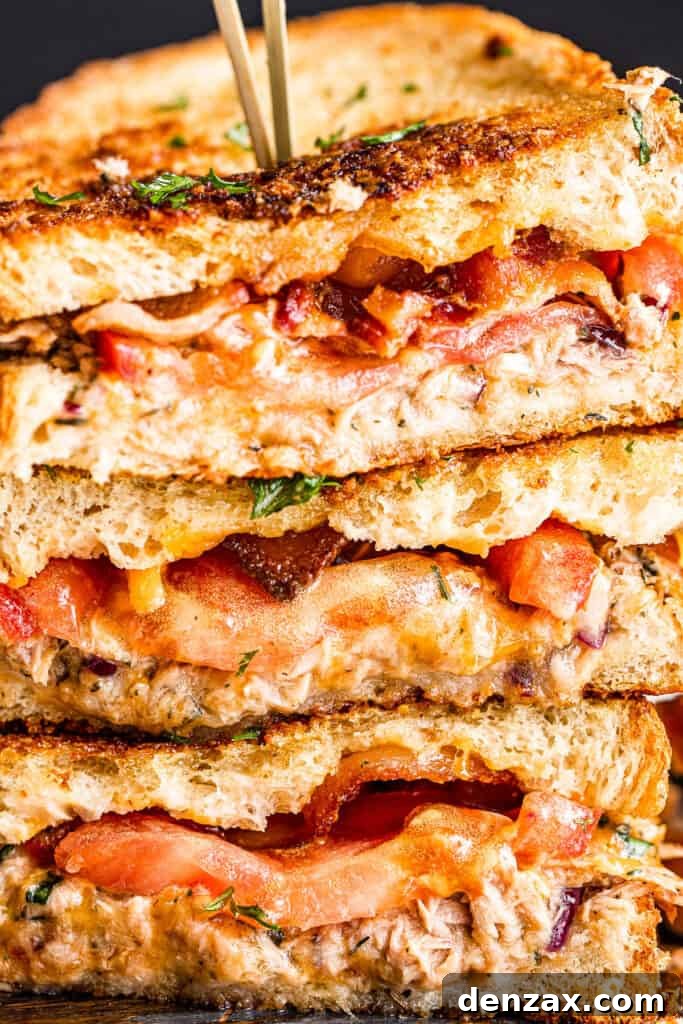 Crispy Tuna Melt Grilled Cheese Sandwich Recipe 3 up close side shot of halved tuna cheese sandwiches and stacked up one on top of the other