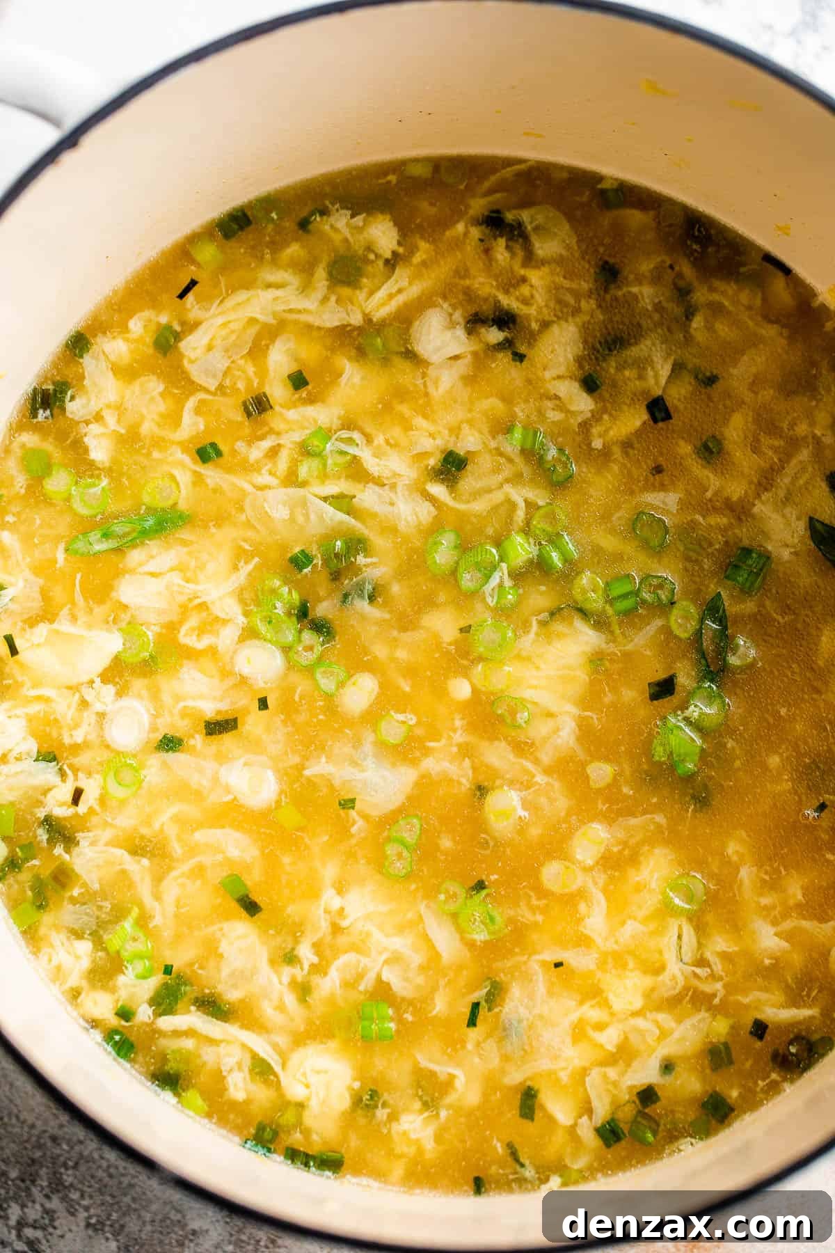 Whip up this simple egg drop soup in just 15 minutes—it might even taste better than the one from your go-to Chinese spot! cooking egg drop soup in a dutch oven