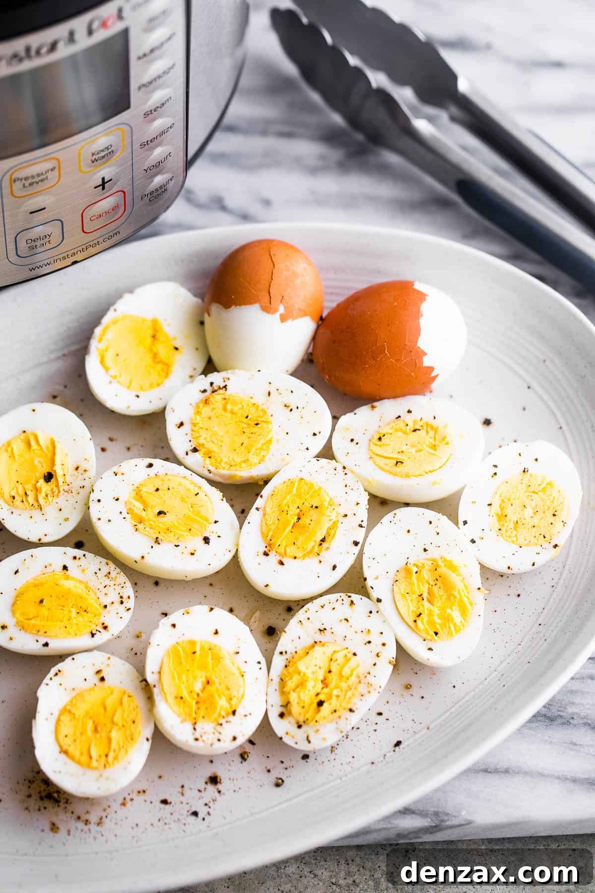 instant pot pressure cooked and a plate of hard boiled halved eggs