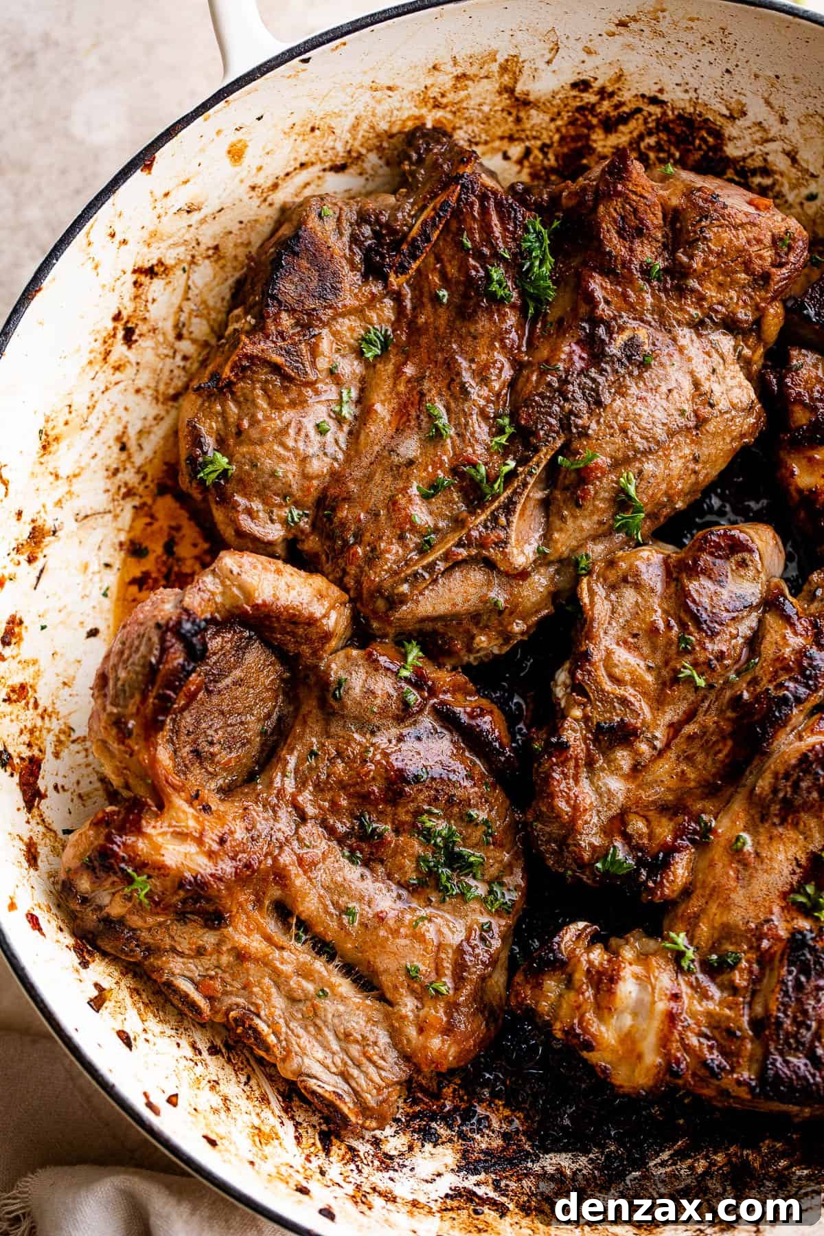 cooking lamb chops in a skillet