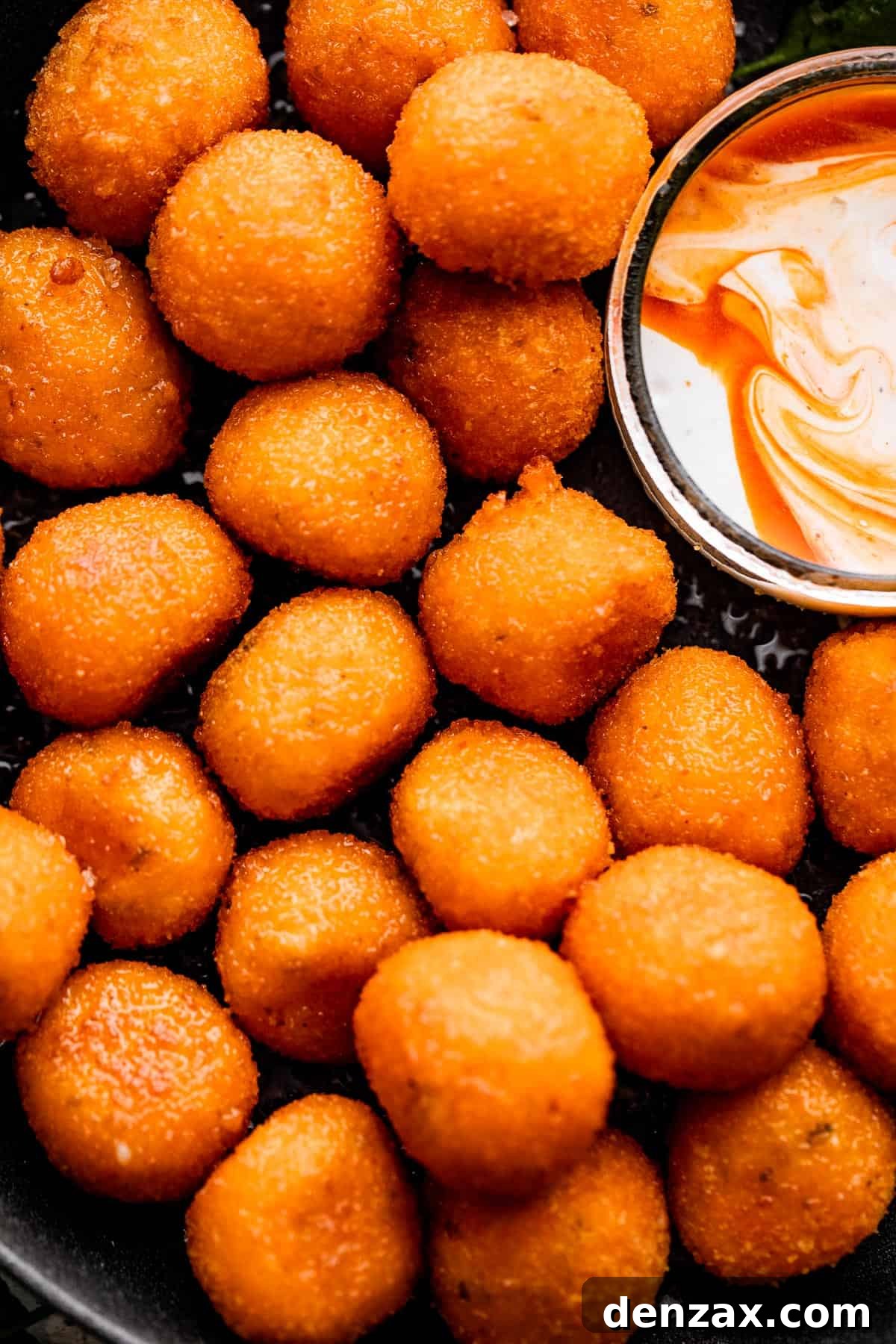 up close shot of air fryer cooked jalapeno popper balls
