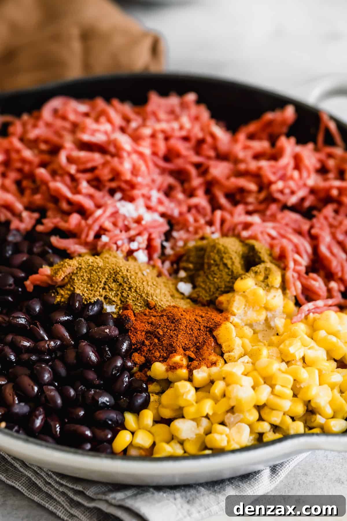 Corn, Ground Beef and Black Beans in a Skillet with Mexican Spices
