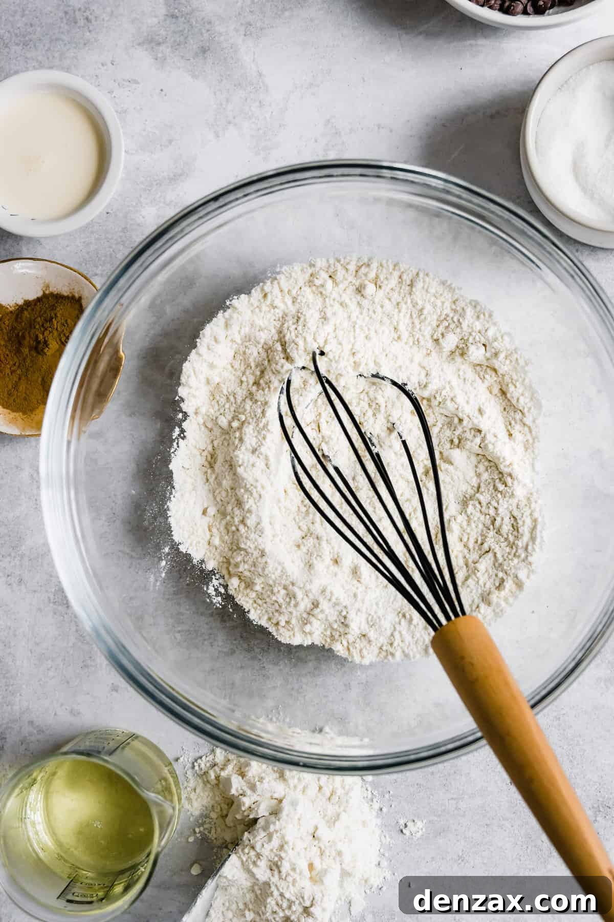 A Glass Bowl Filled with the Combined Dry Ingredients for Homemade Churros