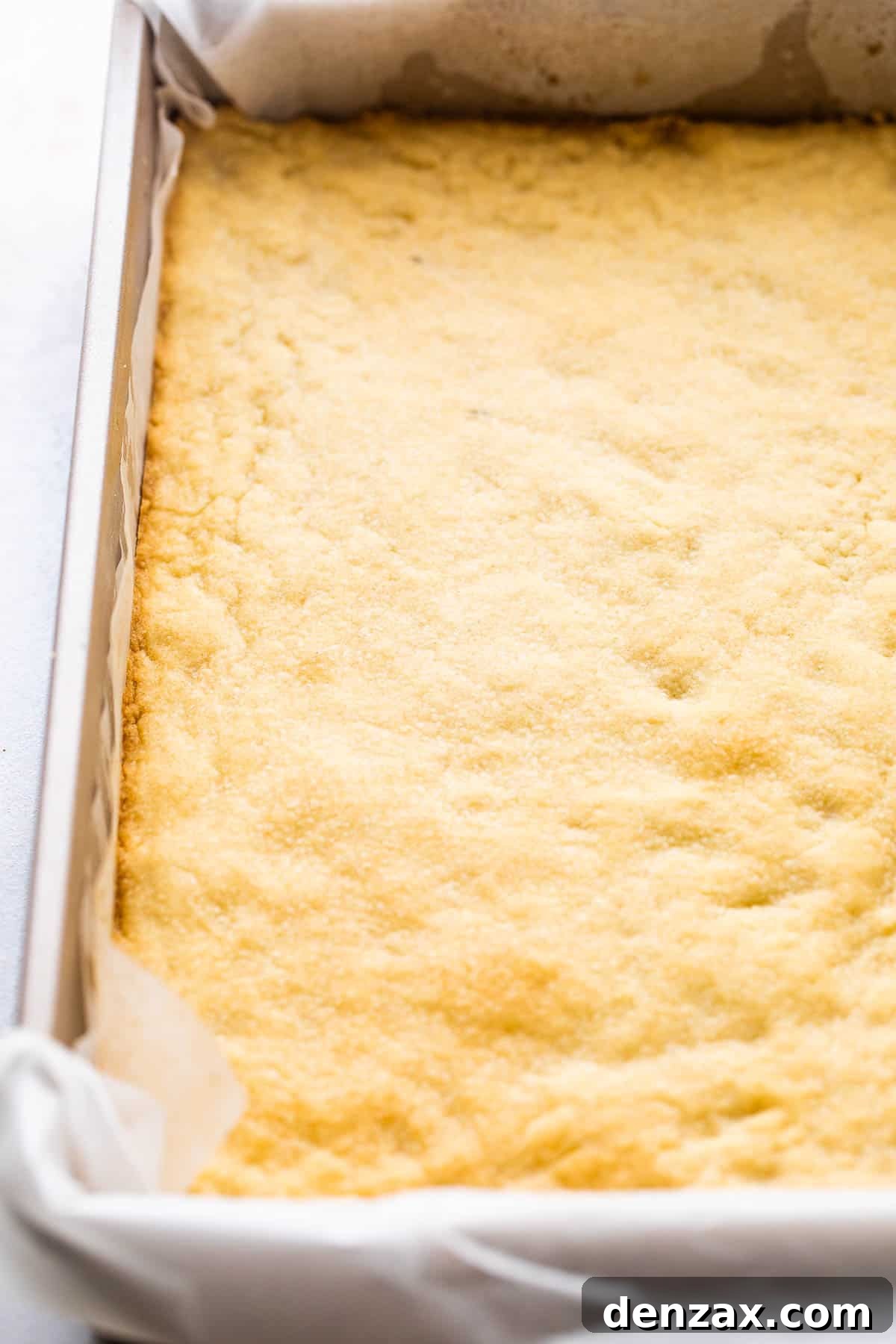 baked shortbread crust in a baking pan