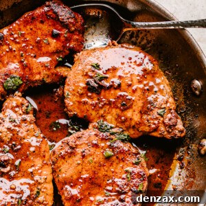 Skillet with pan fried pork chops