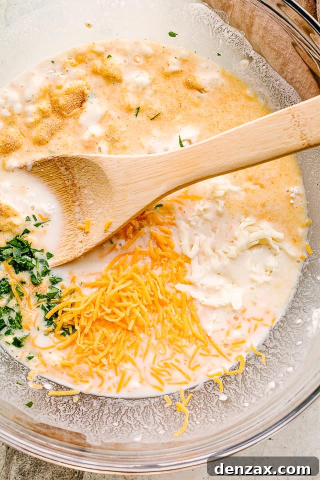 Mixing together dough ingredients.