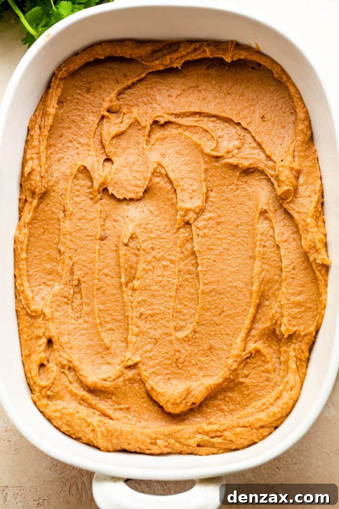 refried beans layer for a seven layer mexican dip