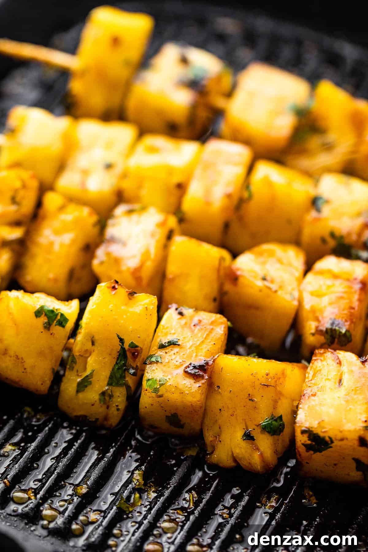 grilling pineapples on skewers