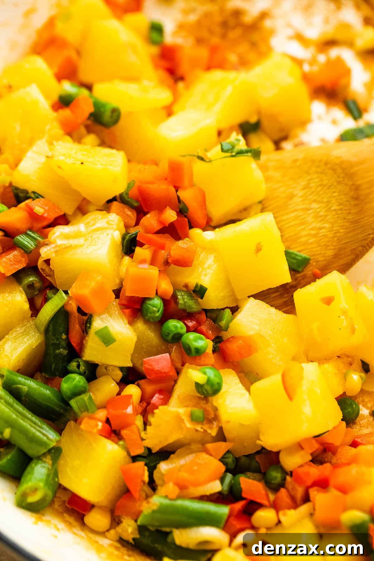 cooking pineapple chunks with veggies
