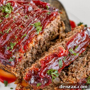 Meatloaf Covered in Barbecue Sauce on a White Serving Platter
