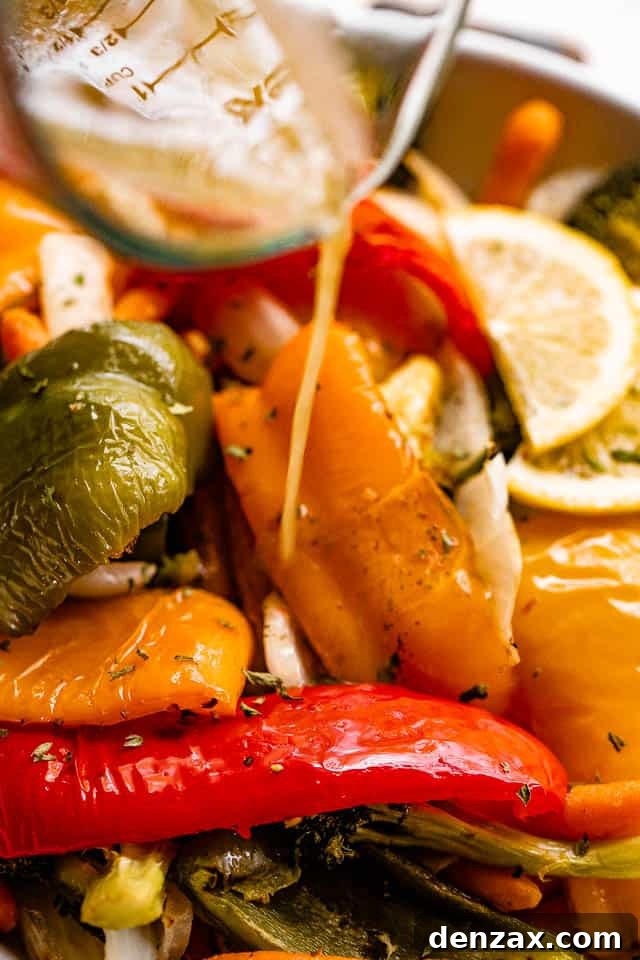 Lemon-Dressed Grilled Vegetables Recipe for Summer Sides 6 pouring lemon vinaigrette over grilled bell peppers