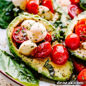 Caprese Stuffed Avocados served on a plate