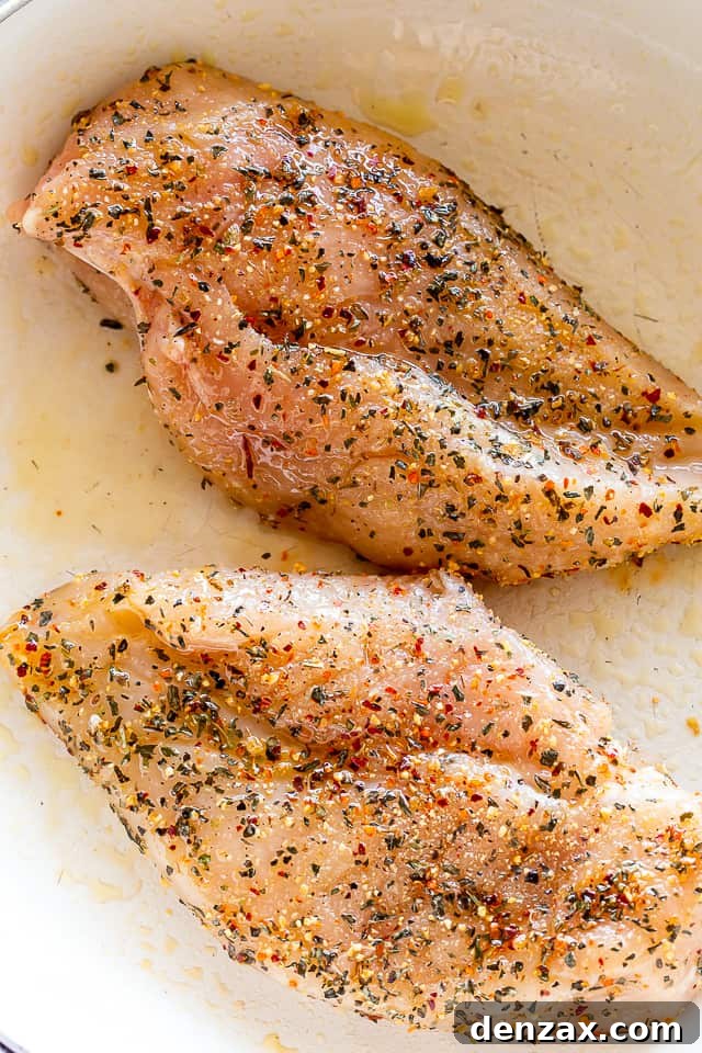 Chicken, seasoned and ready to be sauted