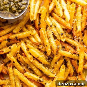 Crispy Pasta Chips: Air Fryer or Oven Recipe Guide 7 close up of baked pasta chips served with basil pesto